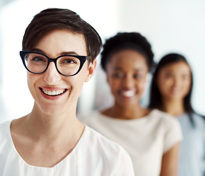 Successful female business woman feeling happy about office teamwork